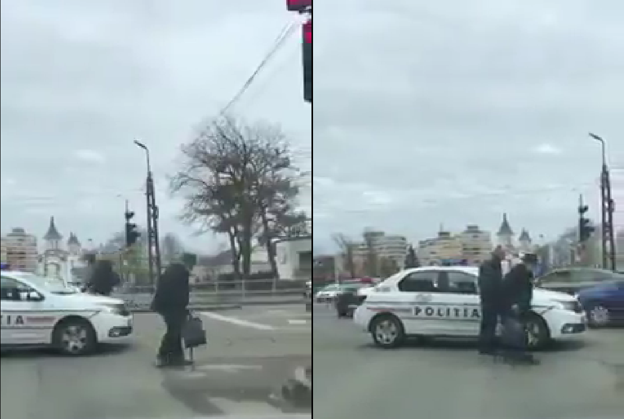 VIDEO! Un politist oradean opreste circulatia pentru a ajuta un batranel sa traverseze strada in siguranta